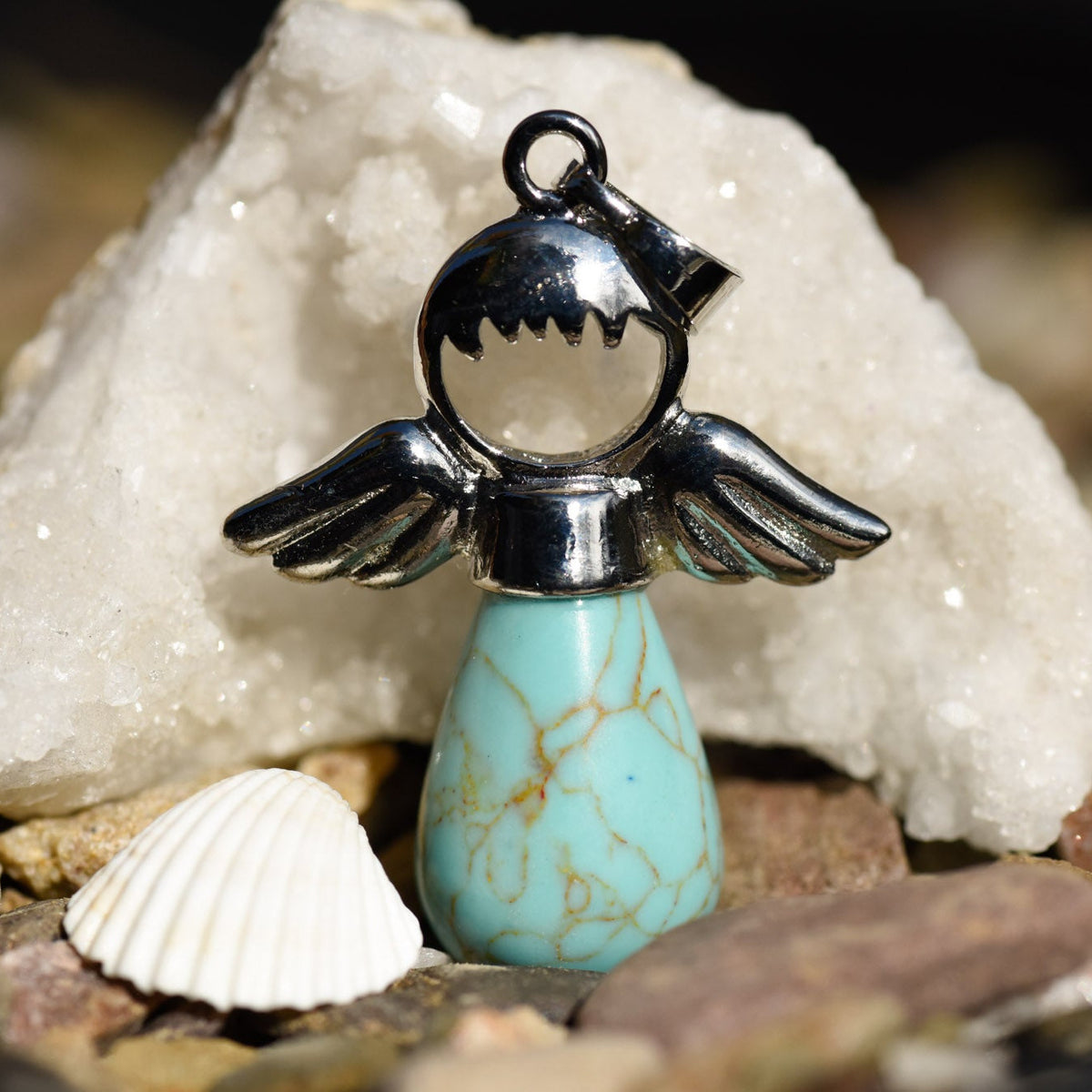 Anhänger, Heilstein in Tropfenform, Metallfassung mit Engelkopf und Flügel, Türkis, alternative Methoden, Steinschmuck